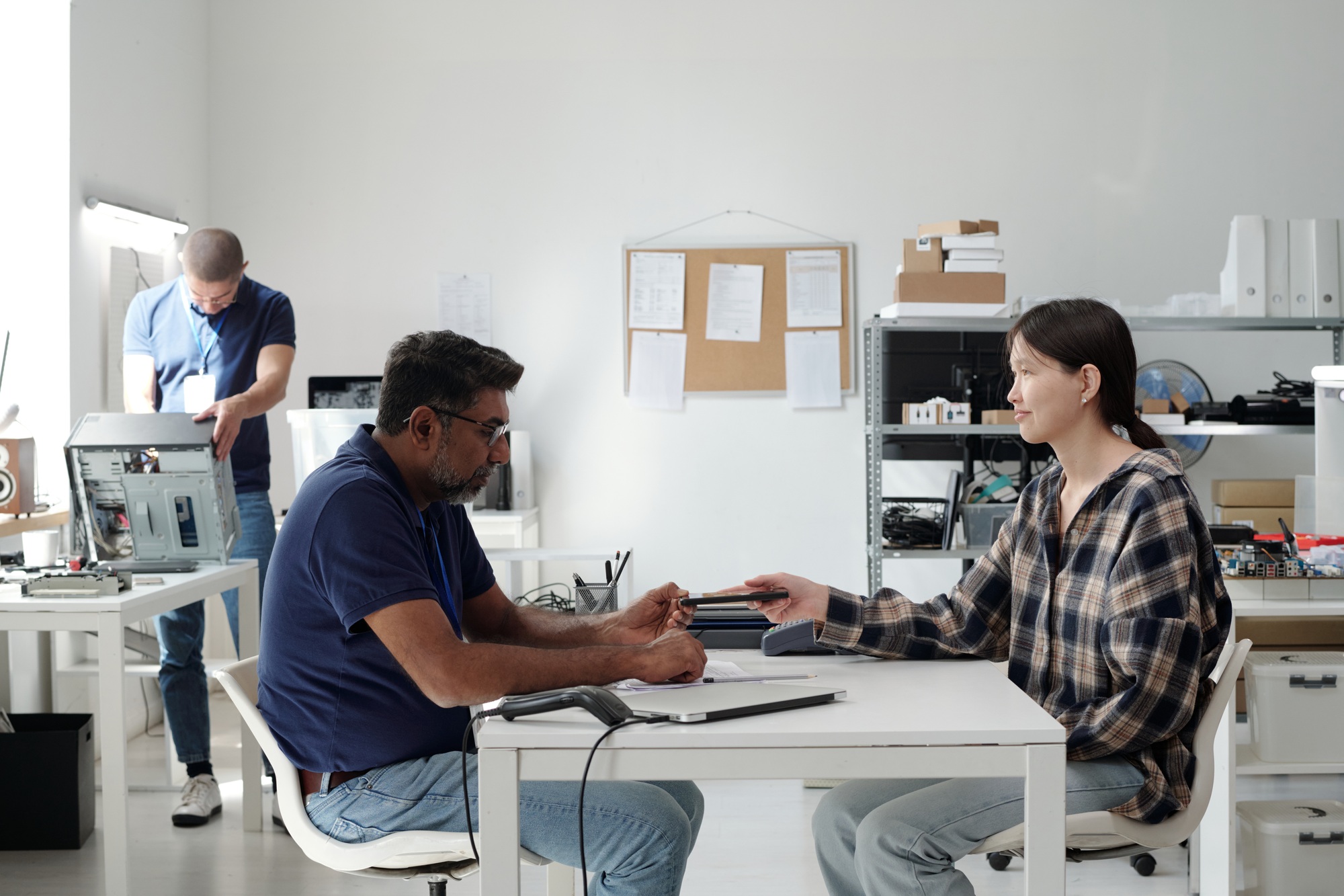 Collaborating in Modern Office Setting With Tech Gadgets